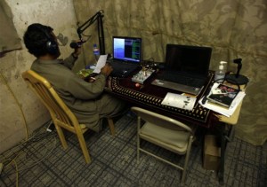 DJ-Ashiqullah-works-at-the-Garmsir-radio-station-in-Helmand-province-July-7-2009.-The-DJs-of-Radio-Garmsir-in-Afghanistans-lower-Helmand-River-valley-knew-their-station-had-touched-a-nerve-when-the-letters-started-pouring-in.-Fi-650x458